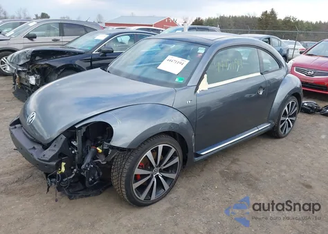 2014 Volkswagen Beetle 2.0T R-Line z USA, uszkodzony, nr VIN 3VW4T7AT1EM613272